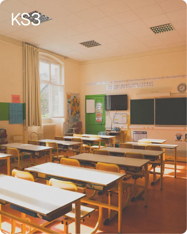 Sunlit classroom with desks and chairs